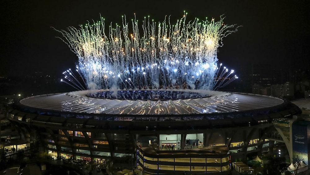 Meriahnya upacara penutupan Olimpiade 2016 di Stadion Maracana. - INDOSPORT